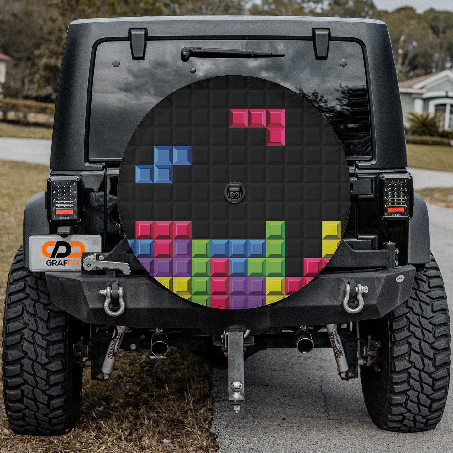 a black jeep with colorful squares on it