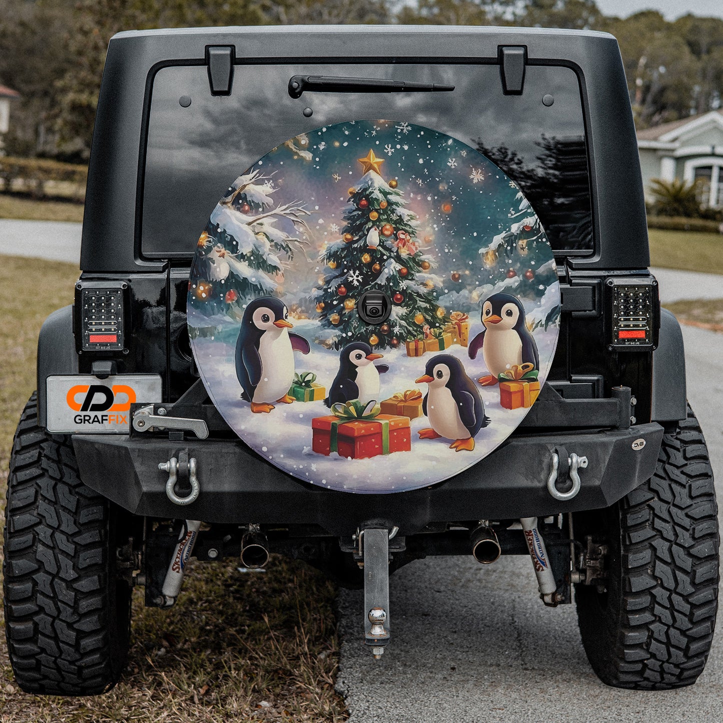 a decorated jeep with penguins and a christmas tree