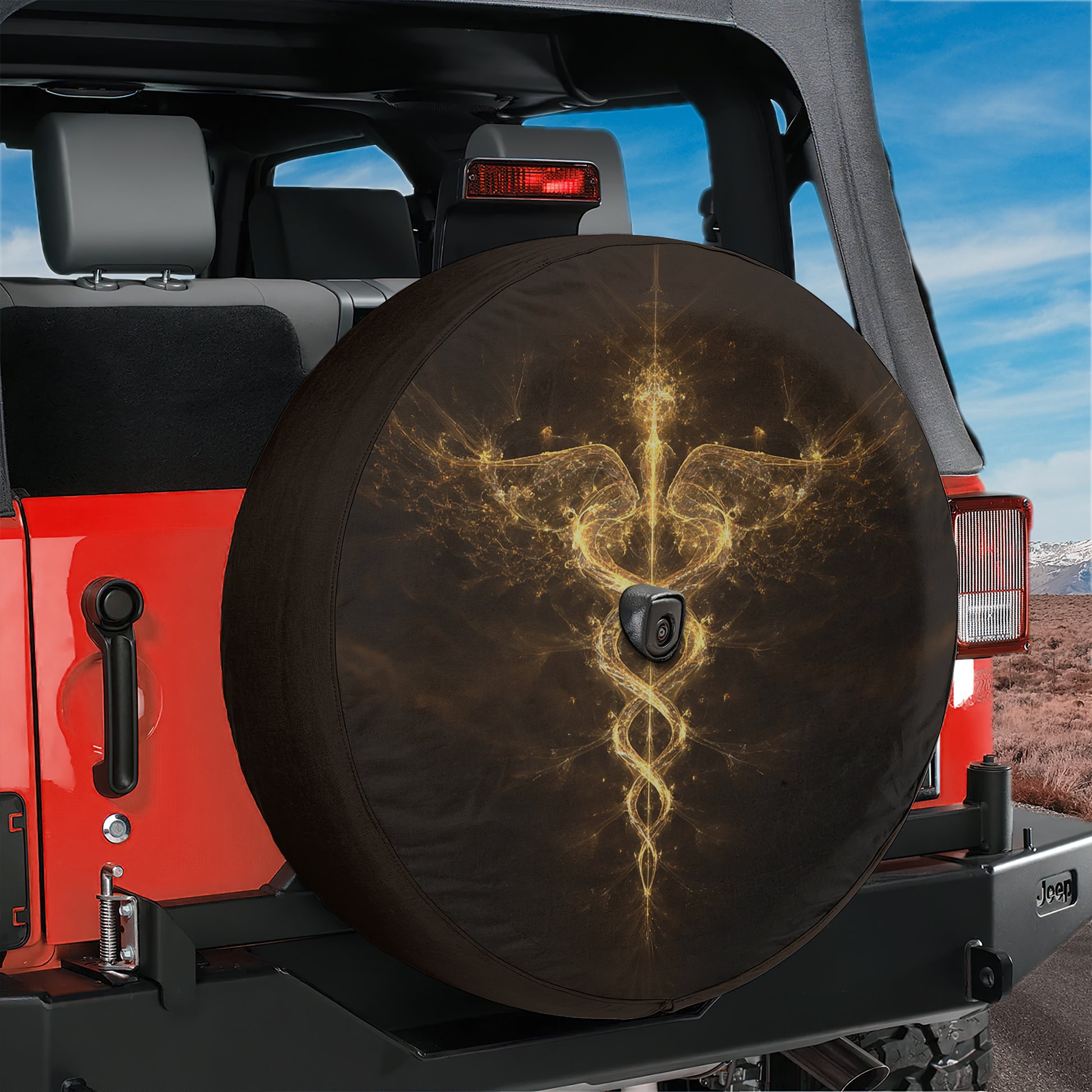 A red Jeep with a black tire cover featuring a golden, abstract design on the back tire.