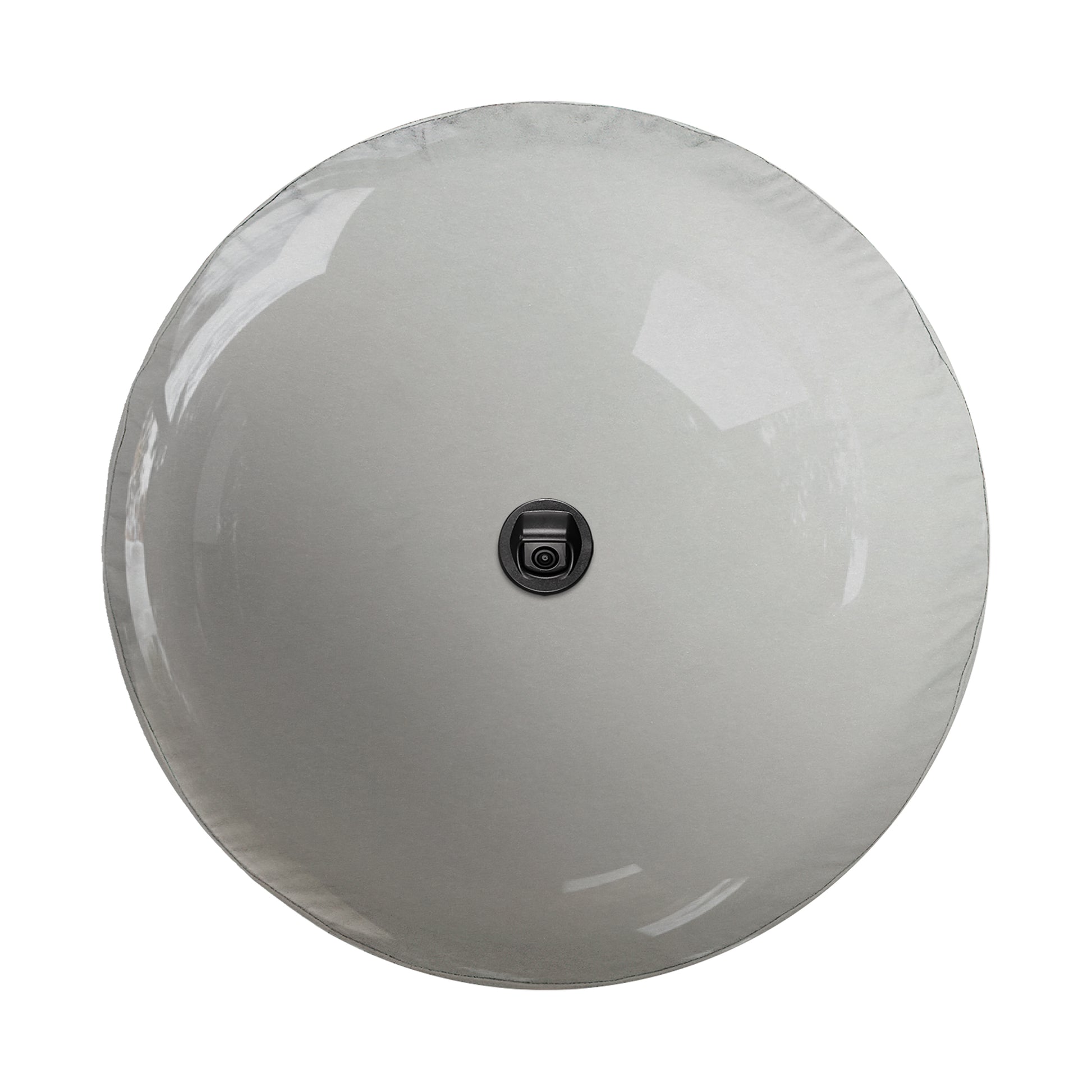 a white, round object with a black camera lens in the center.