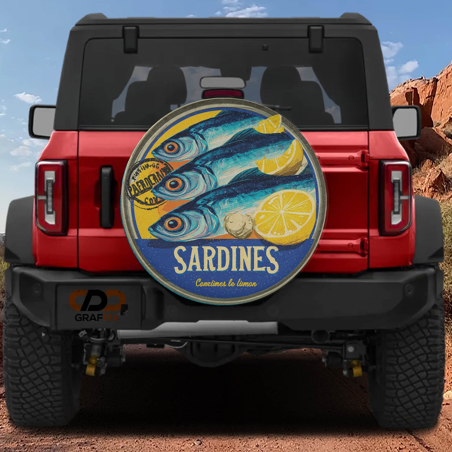 a red Jeep Wrangler with a round decal on the rear window that says "Sardines" and "Concini & Lemon".