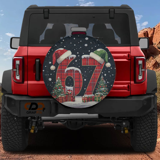 A red Jeep Wrangler with a large, decorative tire cover featuring the number "67" and Christmas trees.