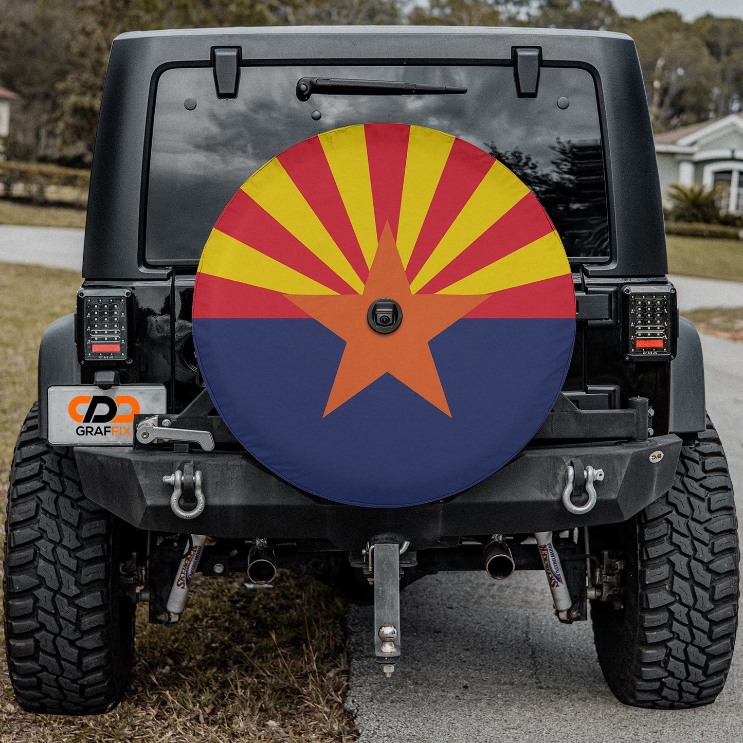 a jeep with the flag of the state of arizona painted on it
