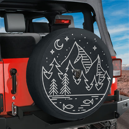 A black tire cover with a white illustration of a mountain landscape and night sky.