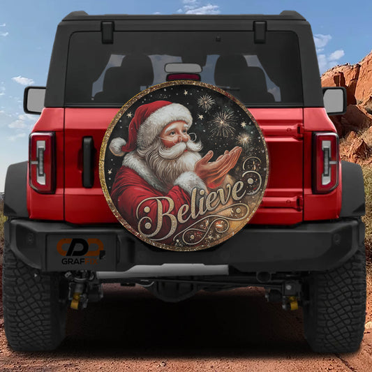 a red Jeep Wrangler with a large, decorative wheel cover featuring a picture of Santa Claus and the word "Believe" written on it.