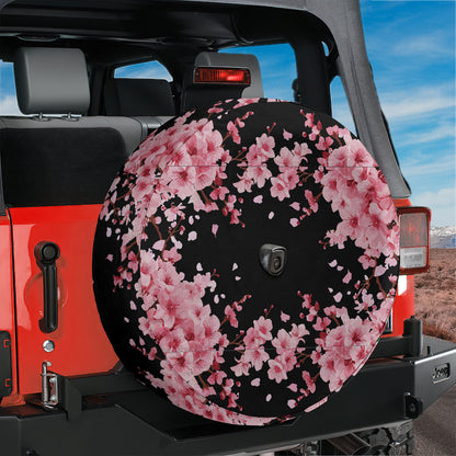 a black and pink flowered umbrella on the back of a jeep
