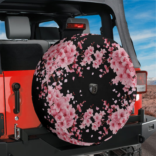 a black and pink flowered umbrella on the back of a jeep