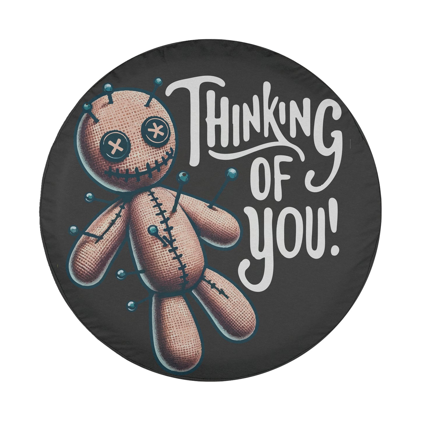 A round tire cover with a cartoon voodoo doll and the text "Thinking of you!"