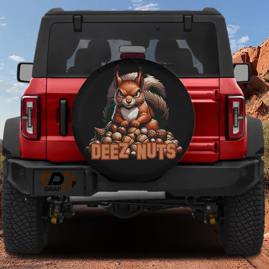 a red Jeep Wrangler with a large tire cover featuring a cartoon squirrel and the text "DEEZ NUTS" on the rear of the vehicle.