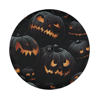a collection of Halloween pumpkins with spooky faces, arranged in a circular pattern.