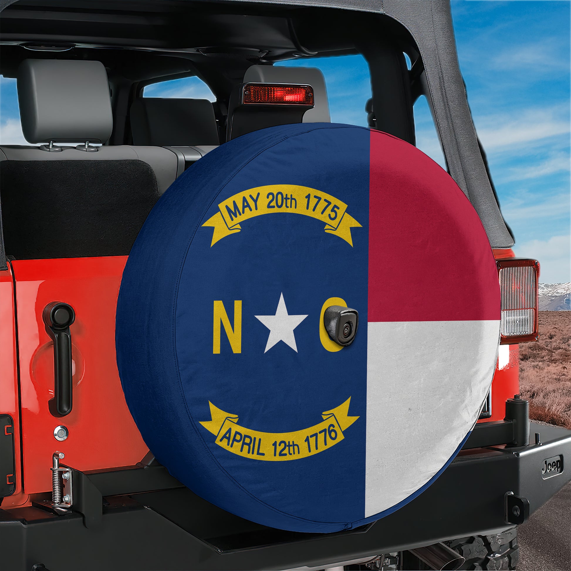 A red Jeep with a spare tire cover featuring the state flag of North Carolina.