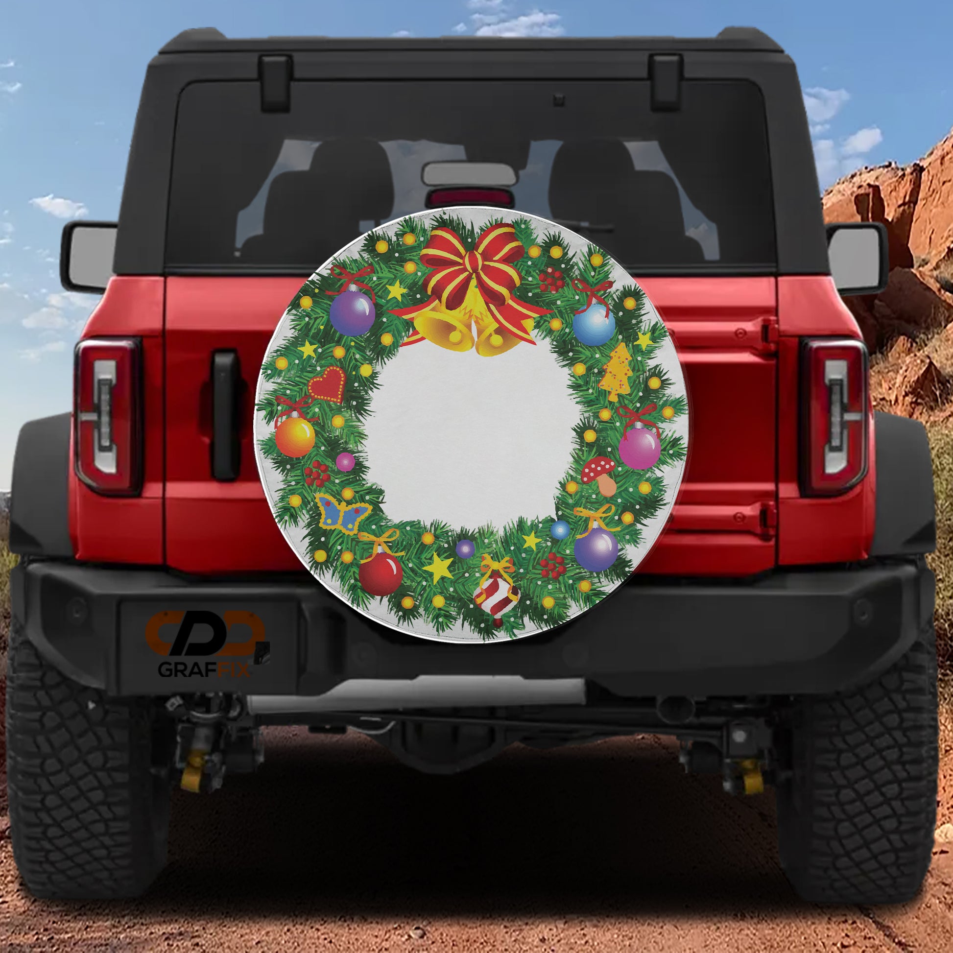 the back of a red Jeep Wrangler with a Christmas wreath decal on the rear window.