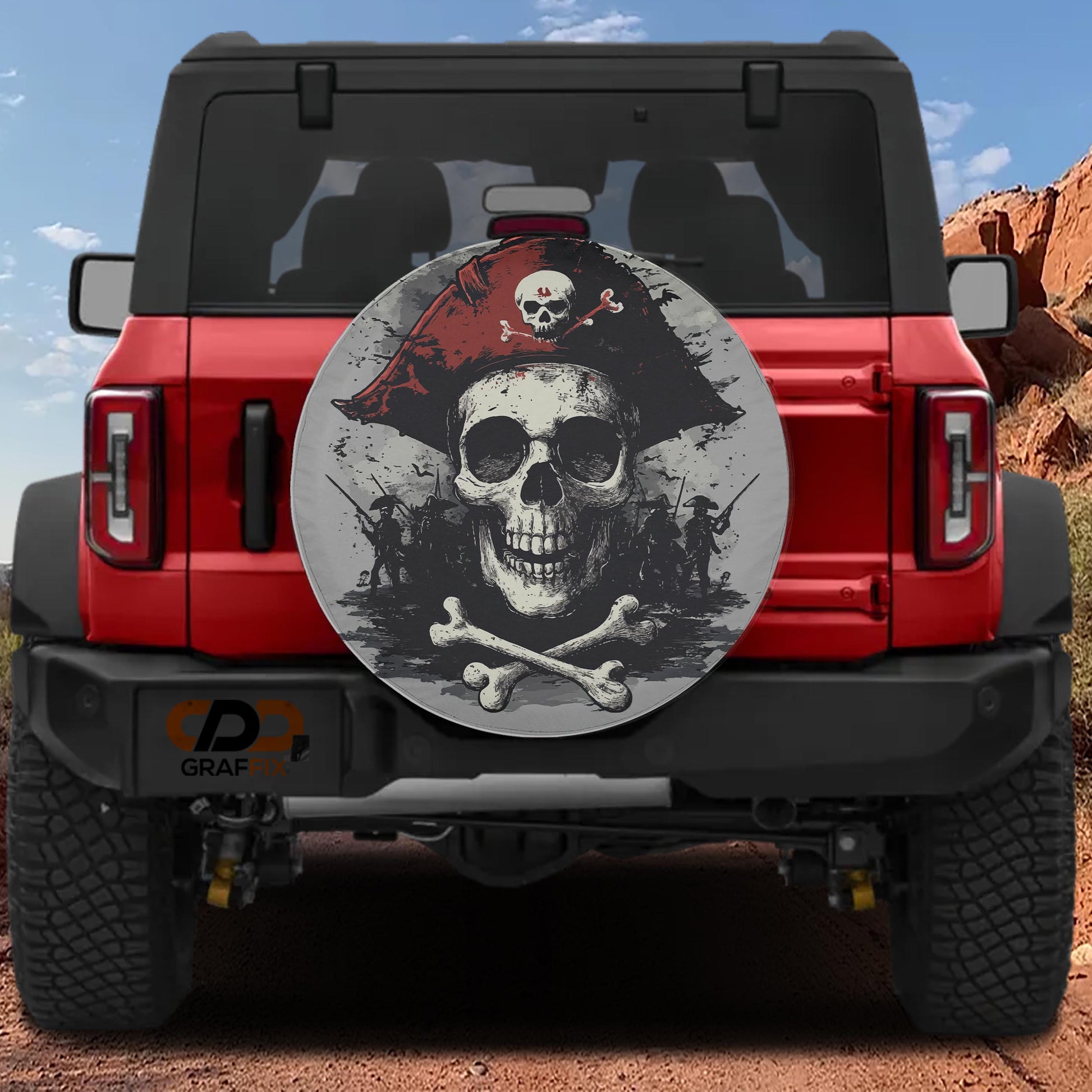 a red Jeep Wrangler with a skull and crossbones decal on the rear window.