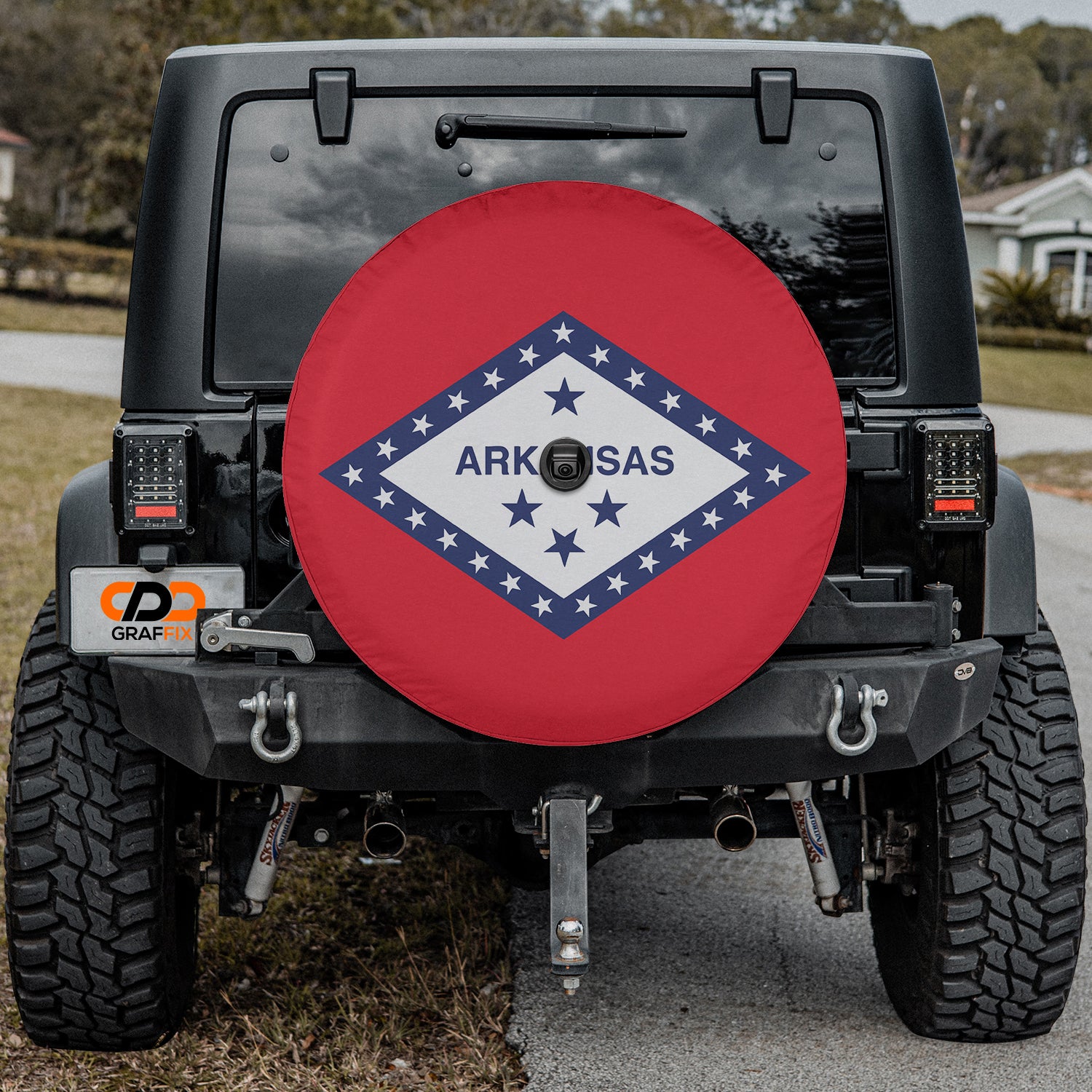 a red, white and blue spare tire cover with the word arkks sass