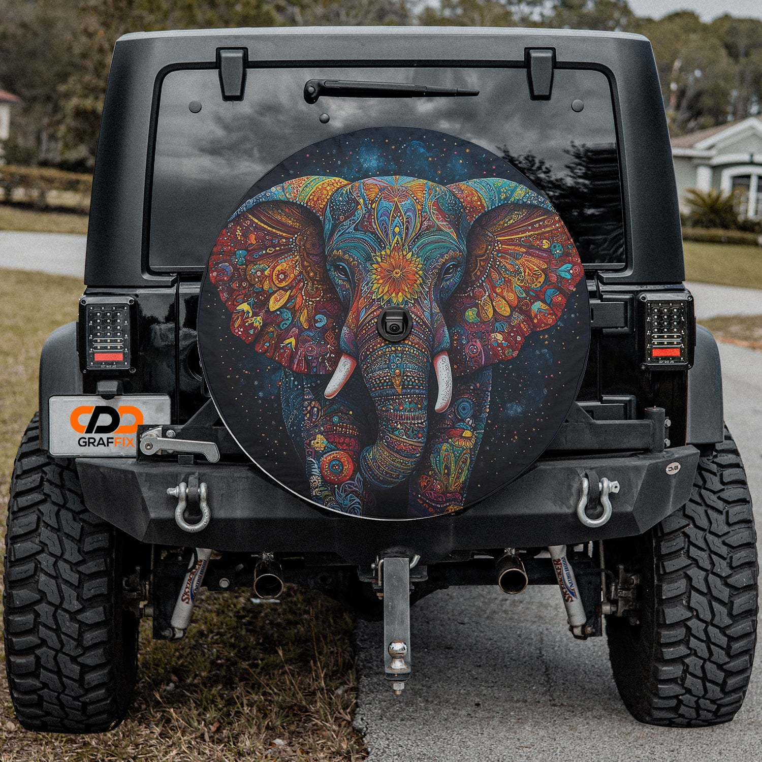 an elephant painted on the back of a jeep