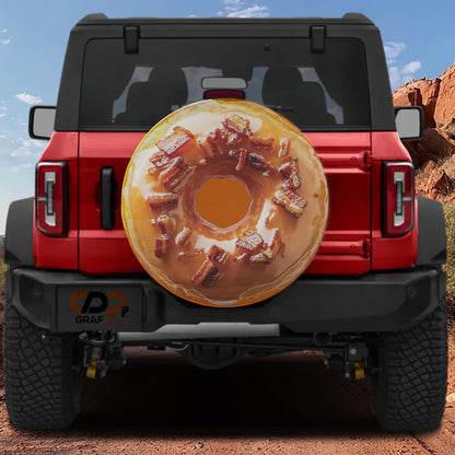 A red Jeep Wrangler with a large donut-shaped spare tire attached to the rear.