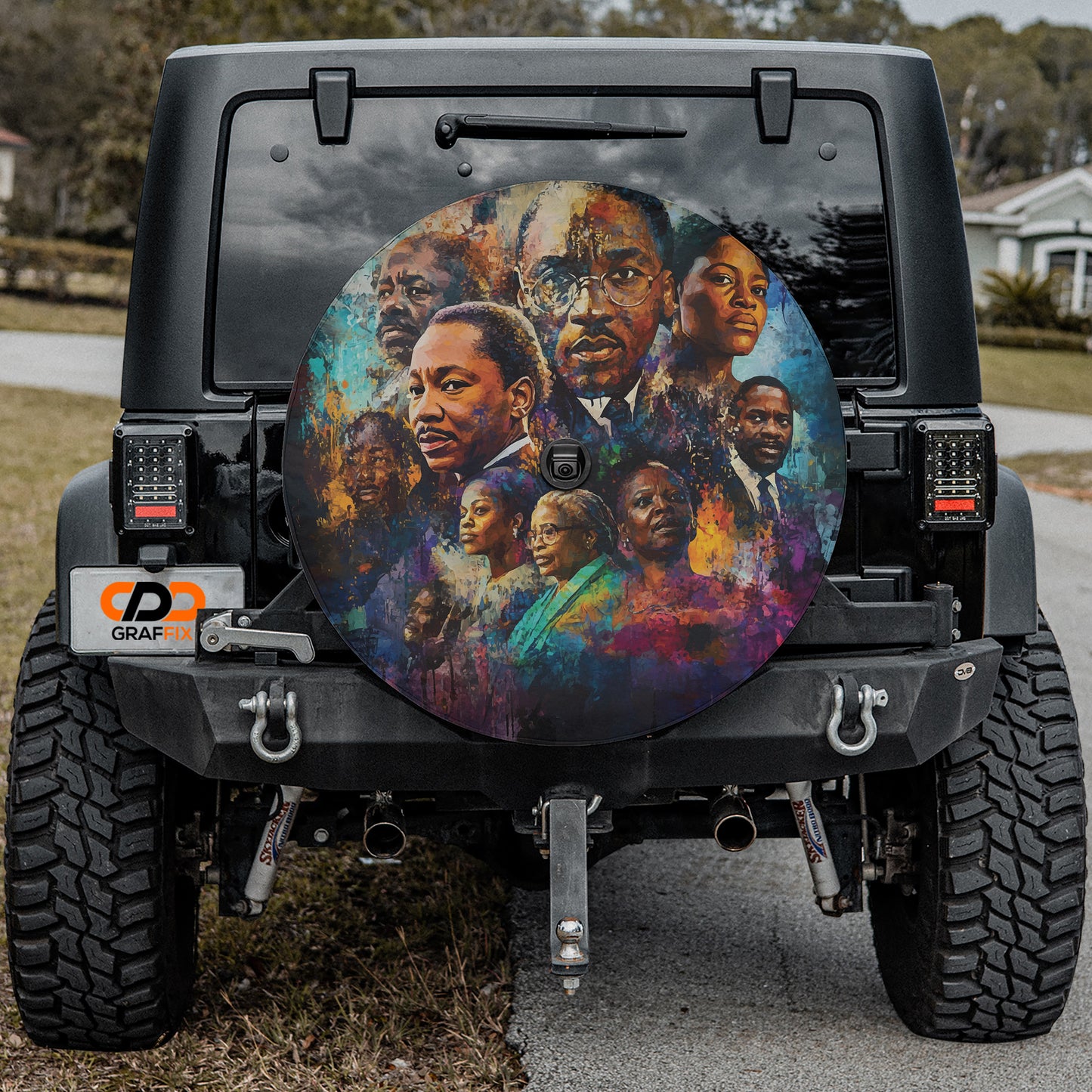 a black jeep with a large, colorful, and artistic design on the rear window.