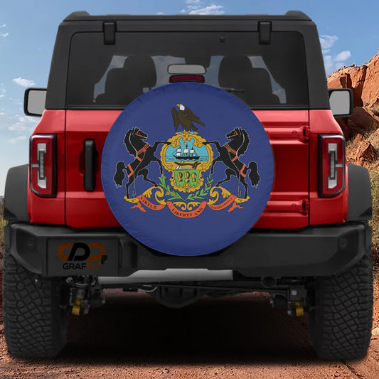 a red Jeep Wrangler with a large blue and gold state flag wheel cover on the rear of the vehicle.