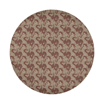 a circular pattern of brown and beige shapes, resembling a camouflage design.