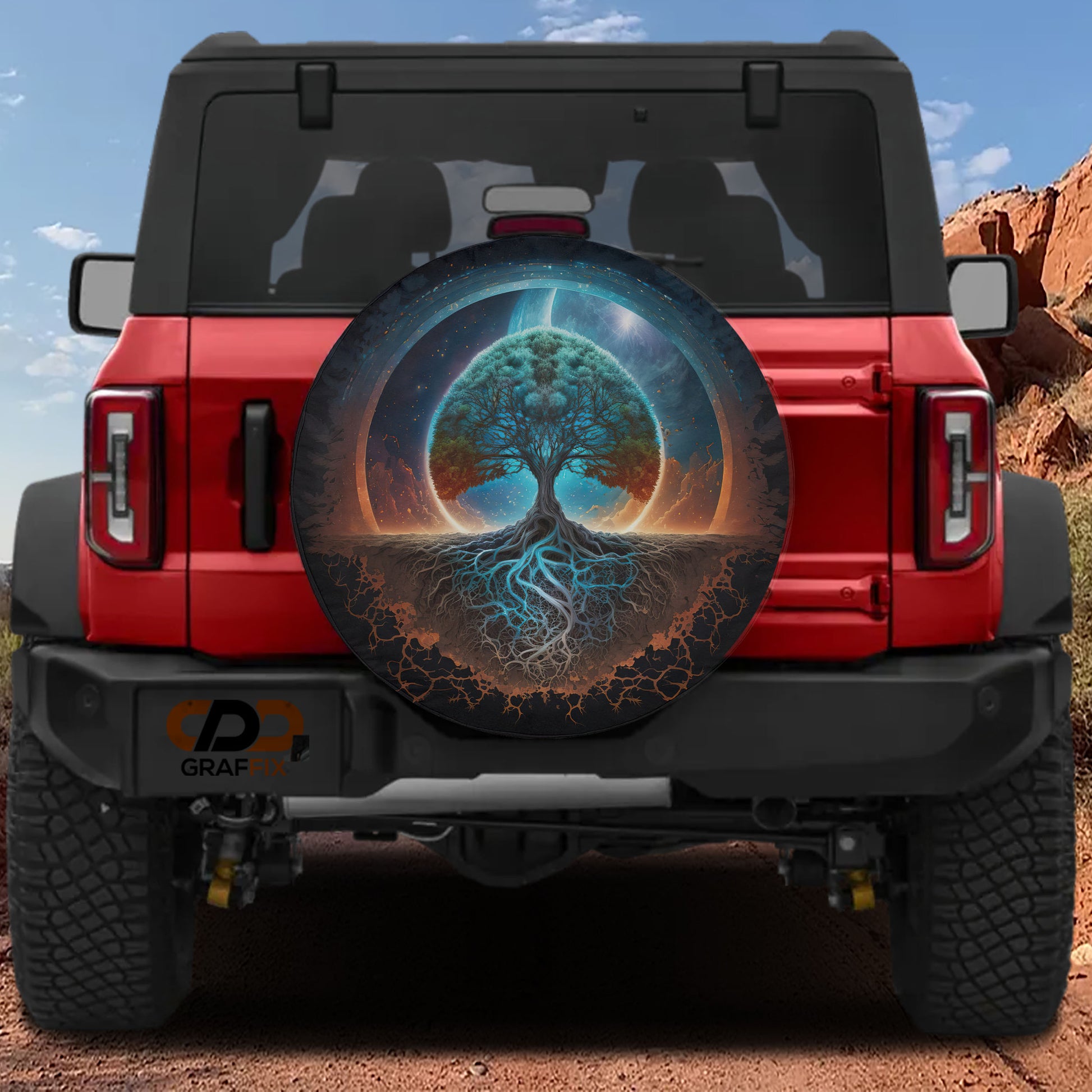 a red Jeep Wrangler with a large tree design on the rear window.