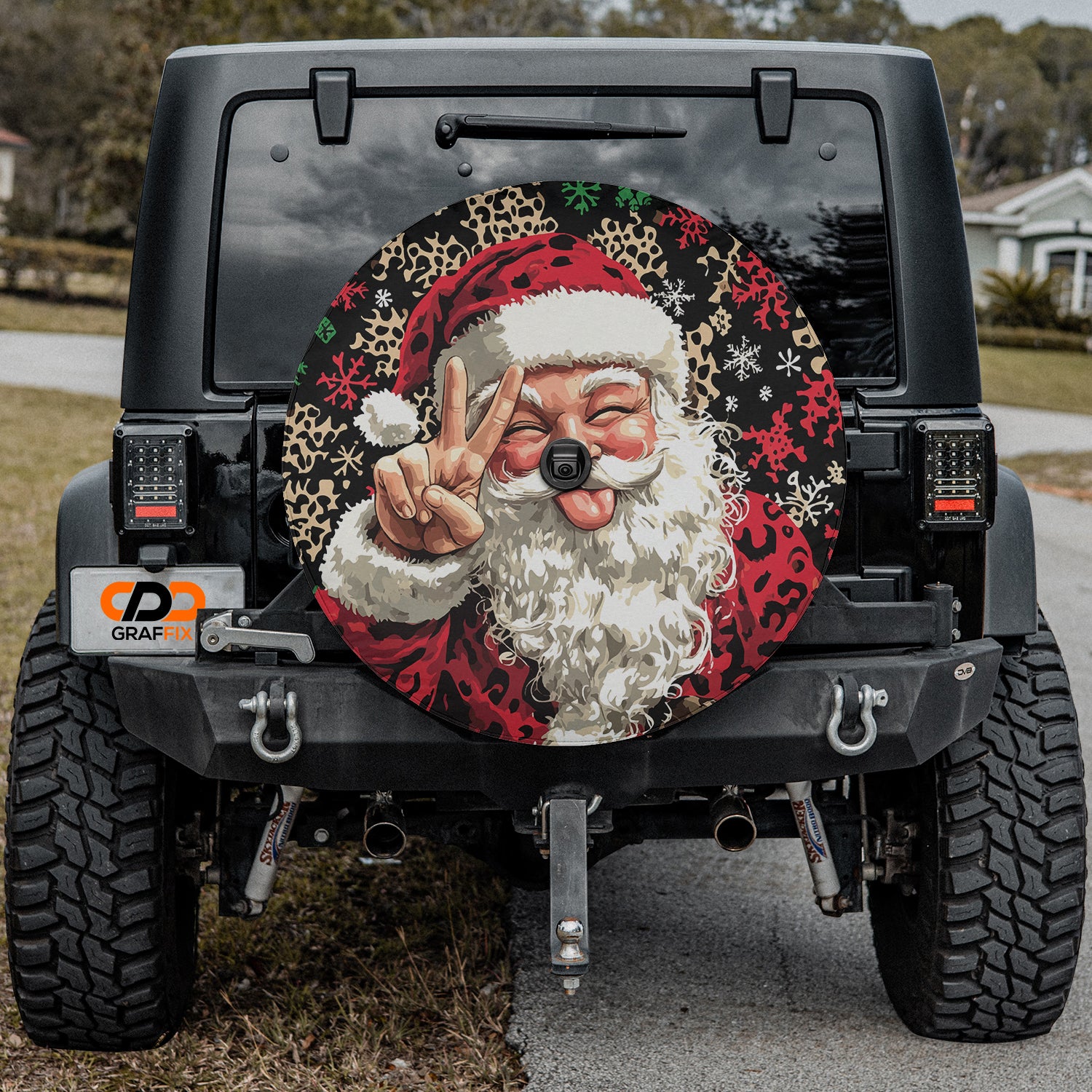 a jeep with a santa clause painted on the side of it