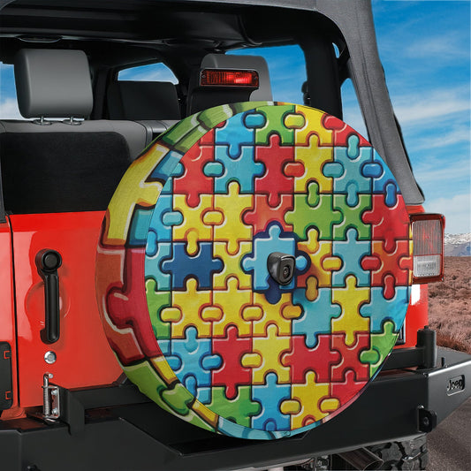 a large colorful puzzle piece on the back of a jeep