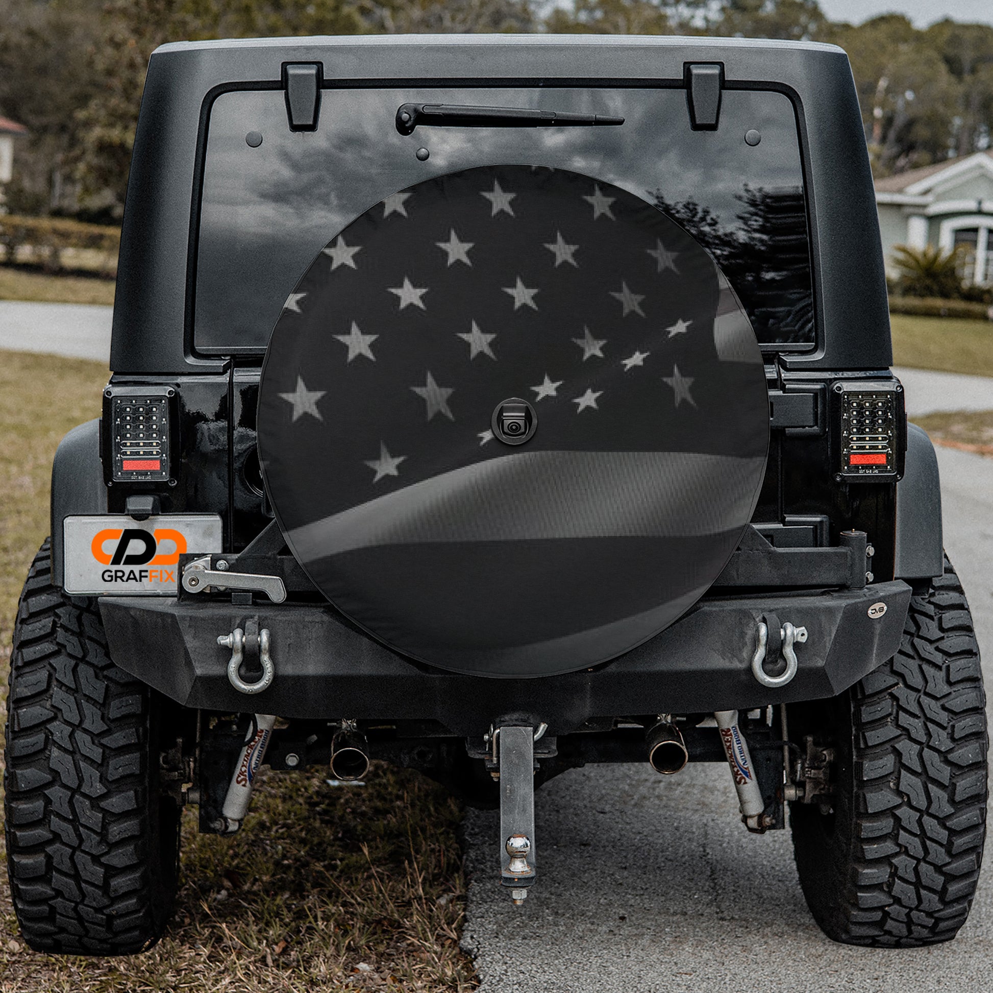 a black jeep with an american flag on it