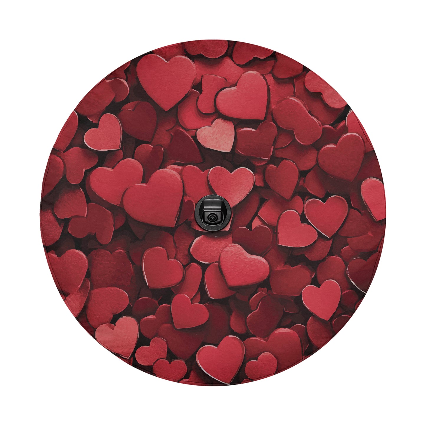 a circular arrangement of red heart-shaped objects, with a black object, possibly a camera or a lens, positioned in the center.
