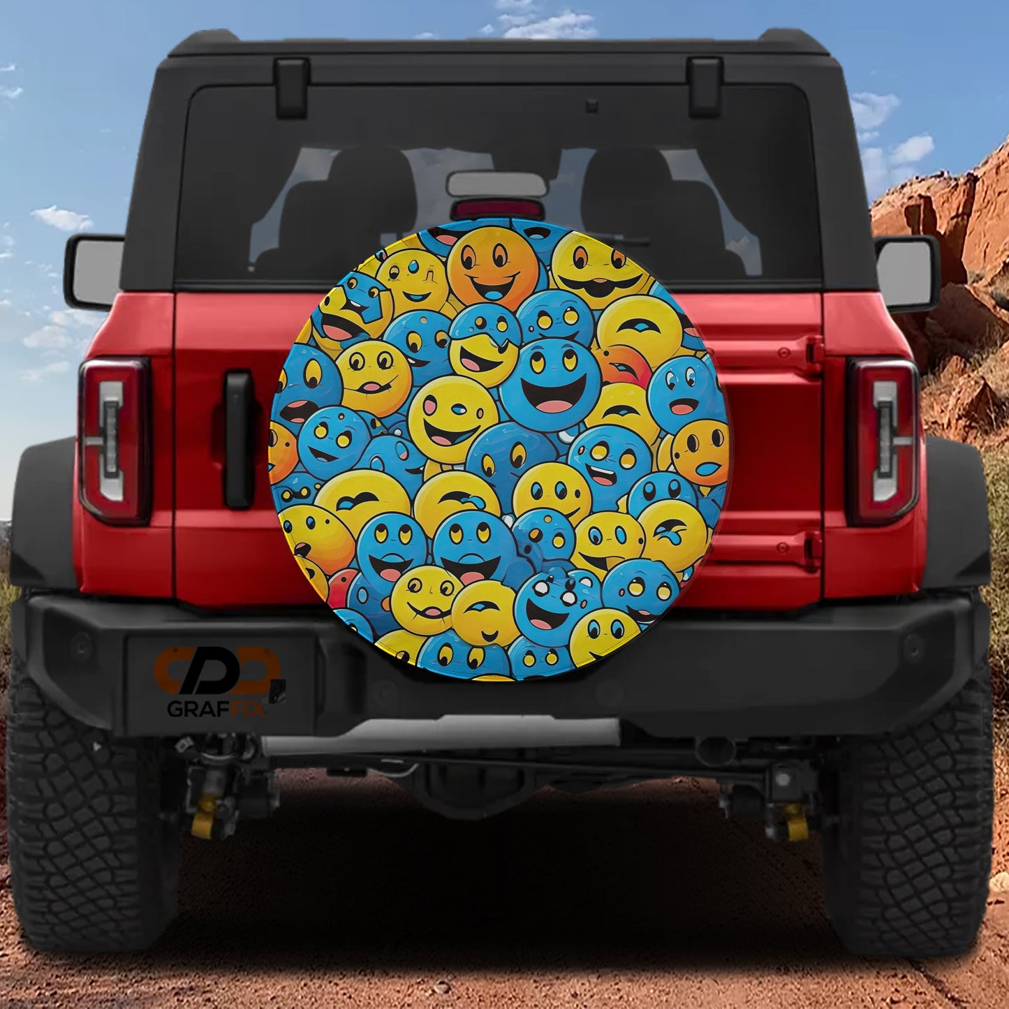 a red Jeep Wrangler with a large, colorful tire cover that displays a variety of smiling and frowning faces in different colors.