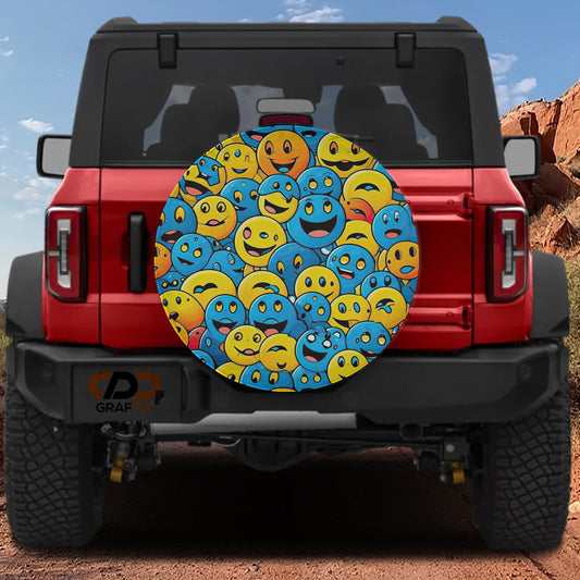 a red Jeep Wrangler with a large, colorful tire cover that displays a variety of smiling and frowning faces in different colors.