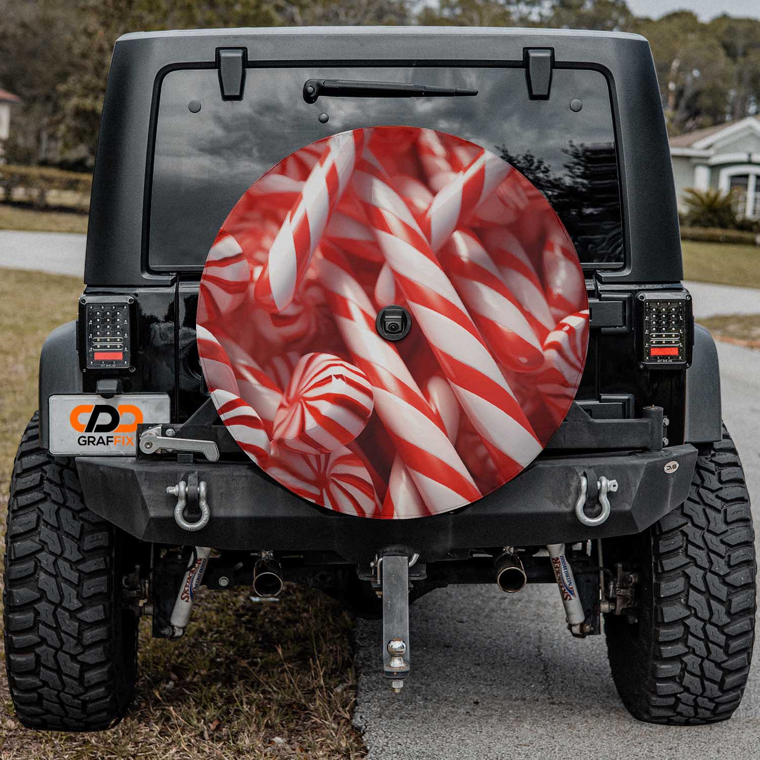 a red and white striped candy cane pattern on the front of a jeep