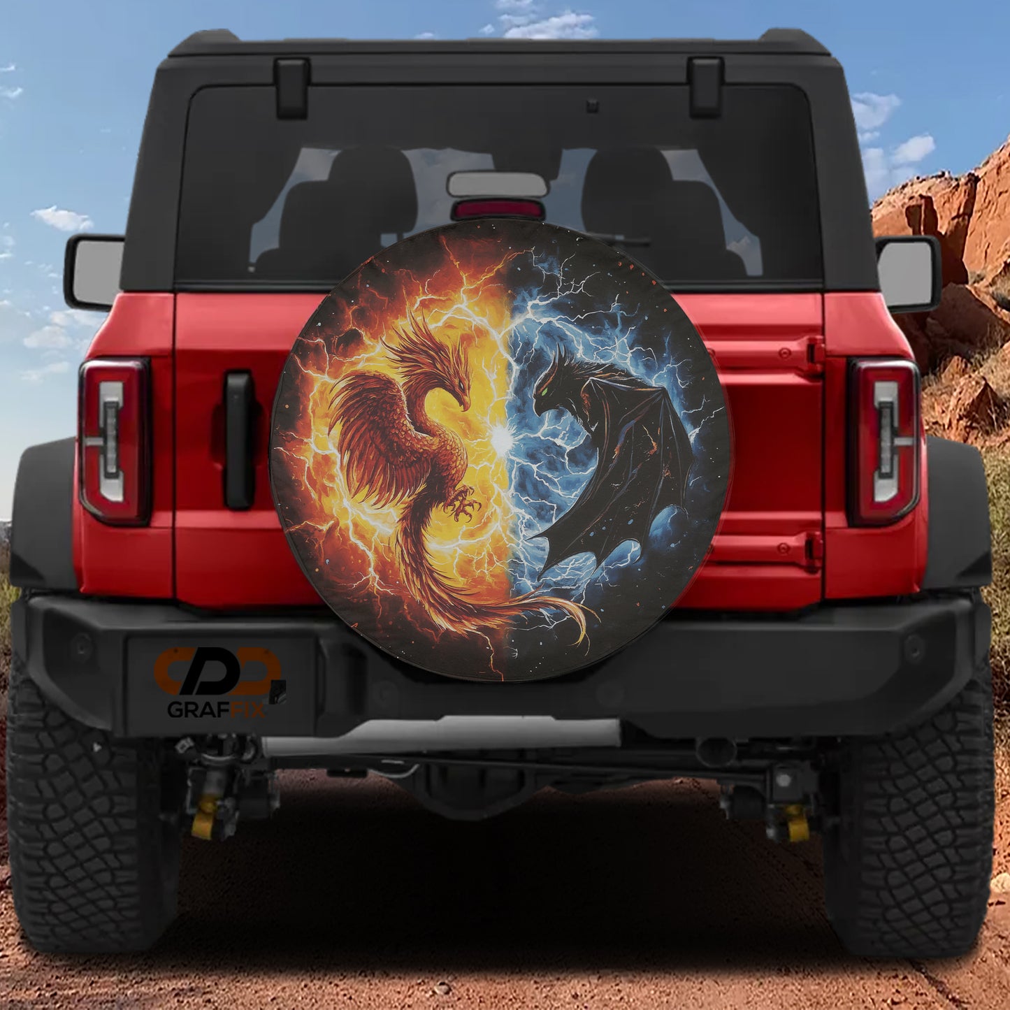 A red Jeep Wrangler with a large, eye-catching wheel cover featuring a dragon and phoenix design.