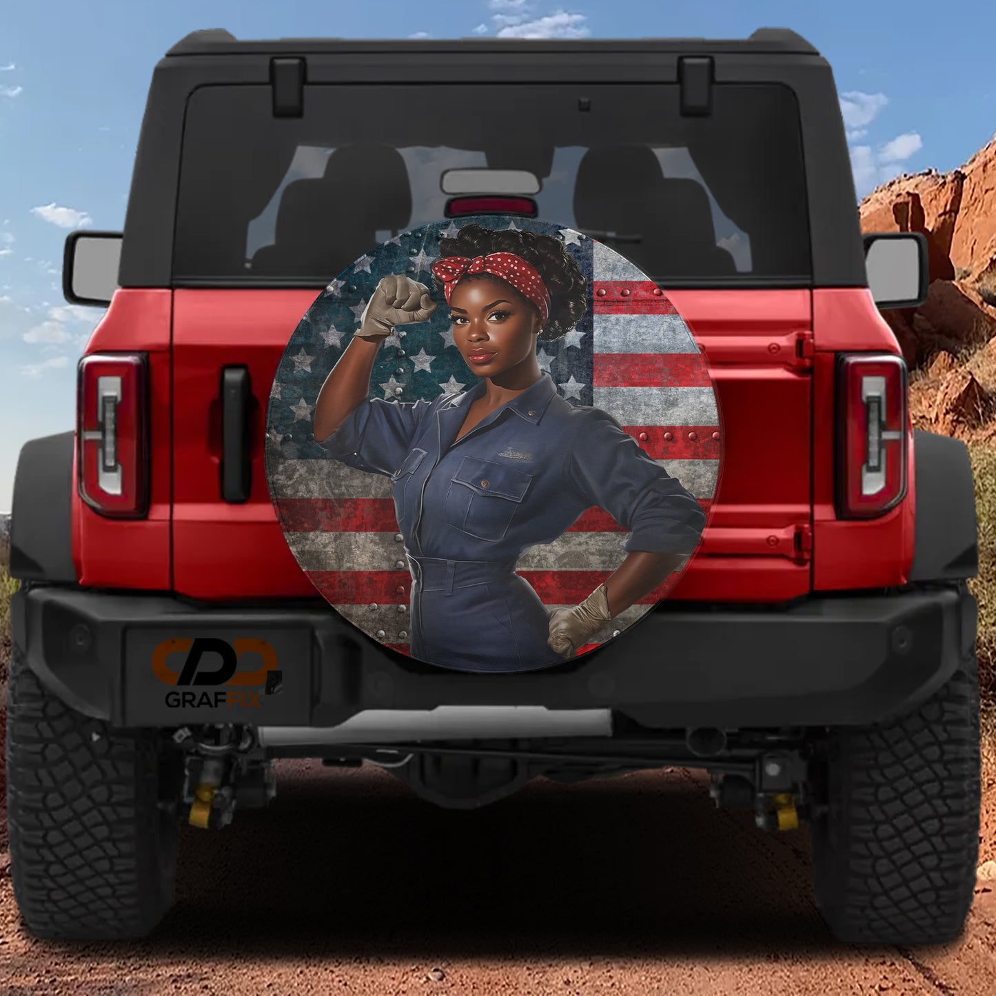 A red Jeep Wrangler with a large American flag decal on the rear window.