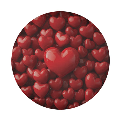 a circular arrangement of numerous red heart-shaped objects, with a single red heart-shaped object standing out in the center.
