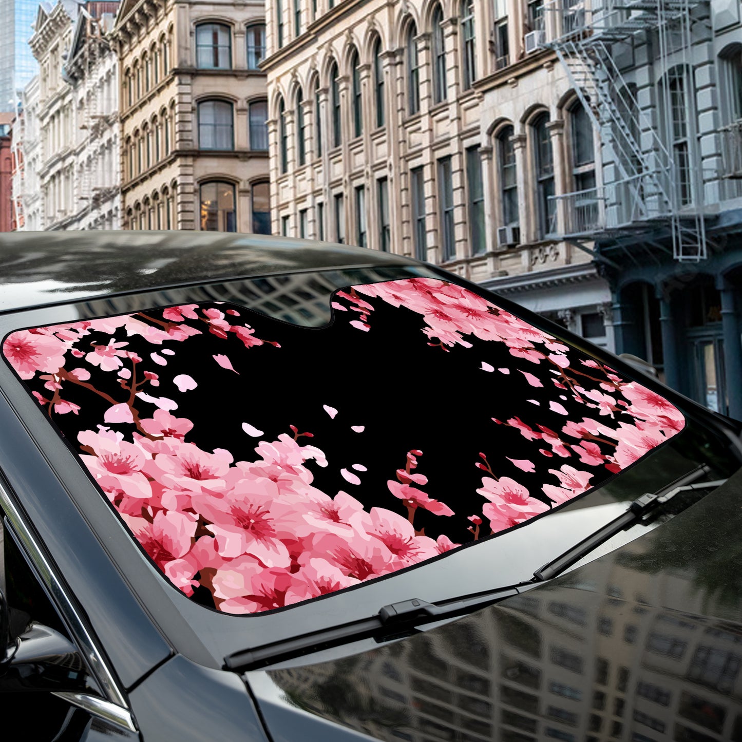 a car with pink flowers on the windshield
