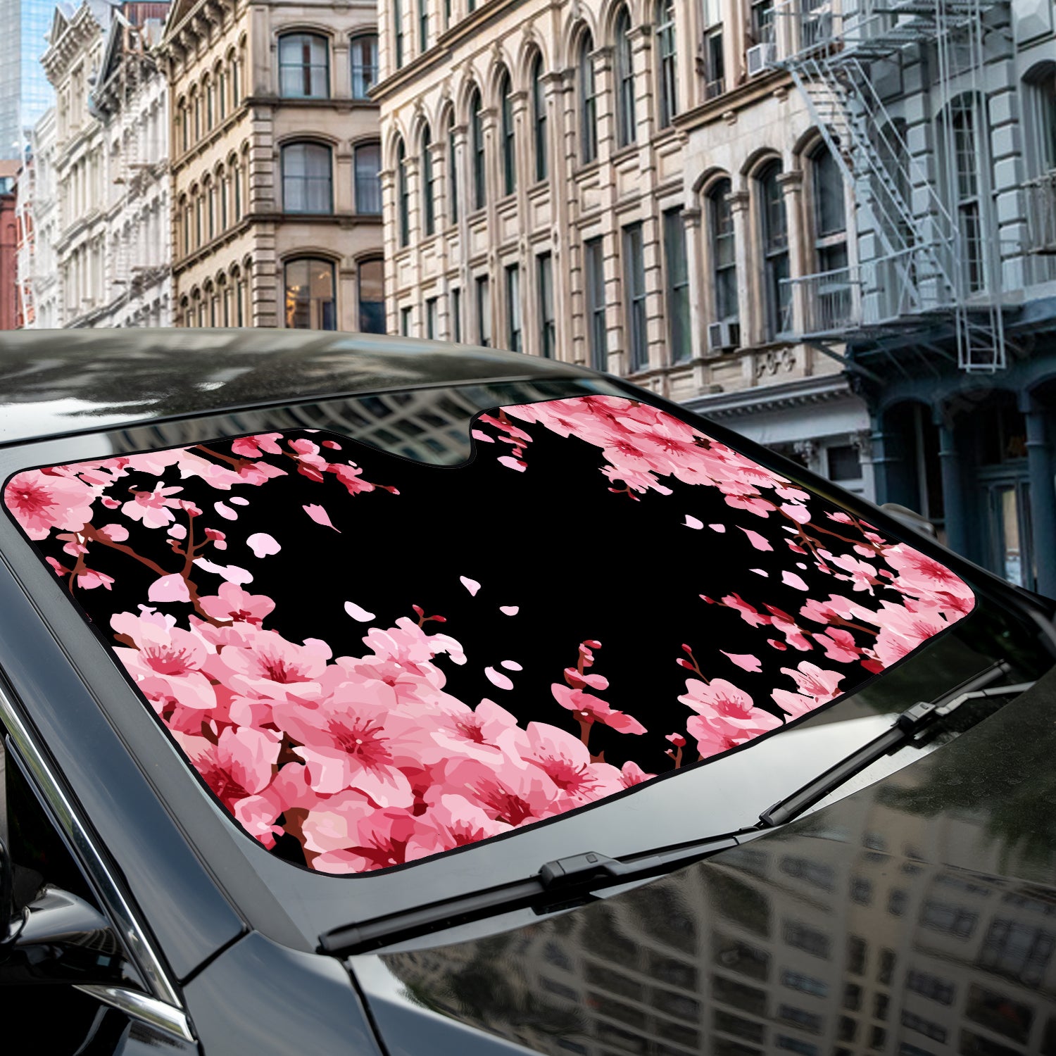 a car with pink flowers on the windshield