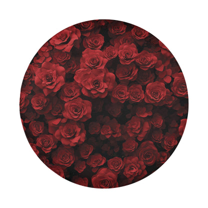 a circular arrangement of red roses, creating a visually striking and vibrant display.
