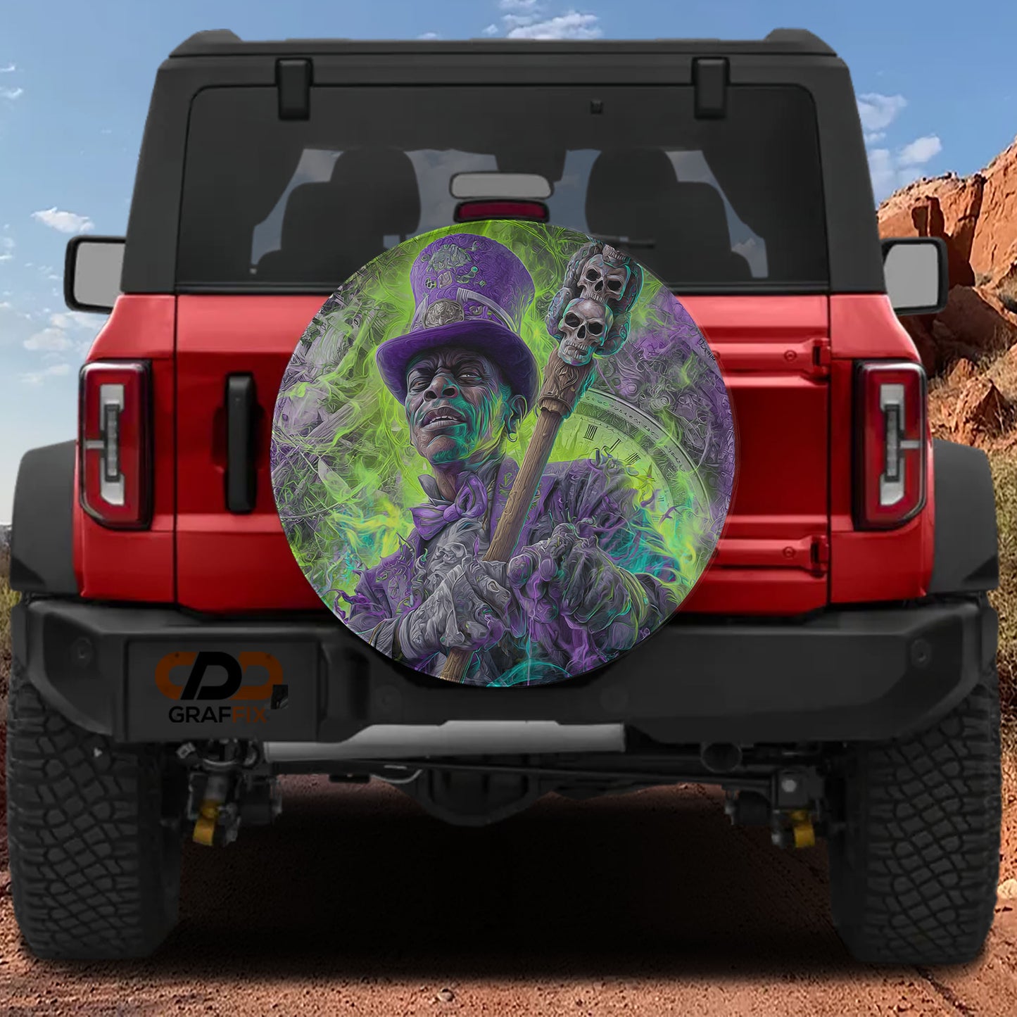 a red Jeep Wrangler with a large, colorful wheel cover depicting a character with a skull and crossbones design.