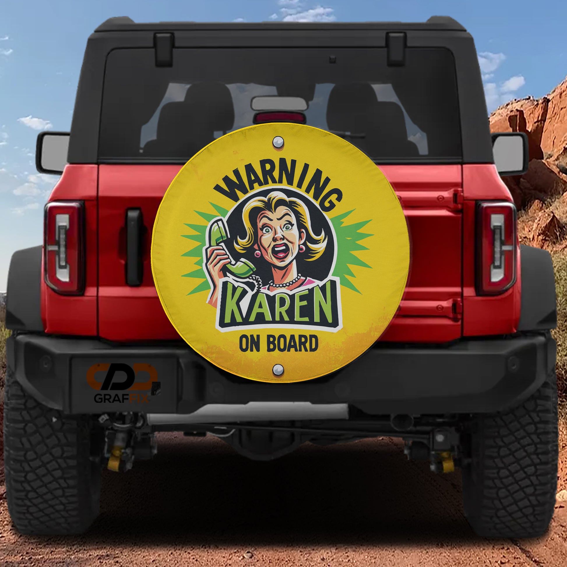 A red Jeep Wrangler with a large, round decal on the rear window that says "WARNING KAREN ON BOARD".