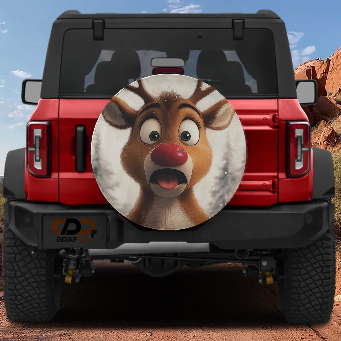 A red Jeep Wrangler with a large deer-like graphic on the rear window.