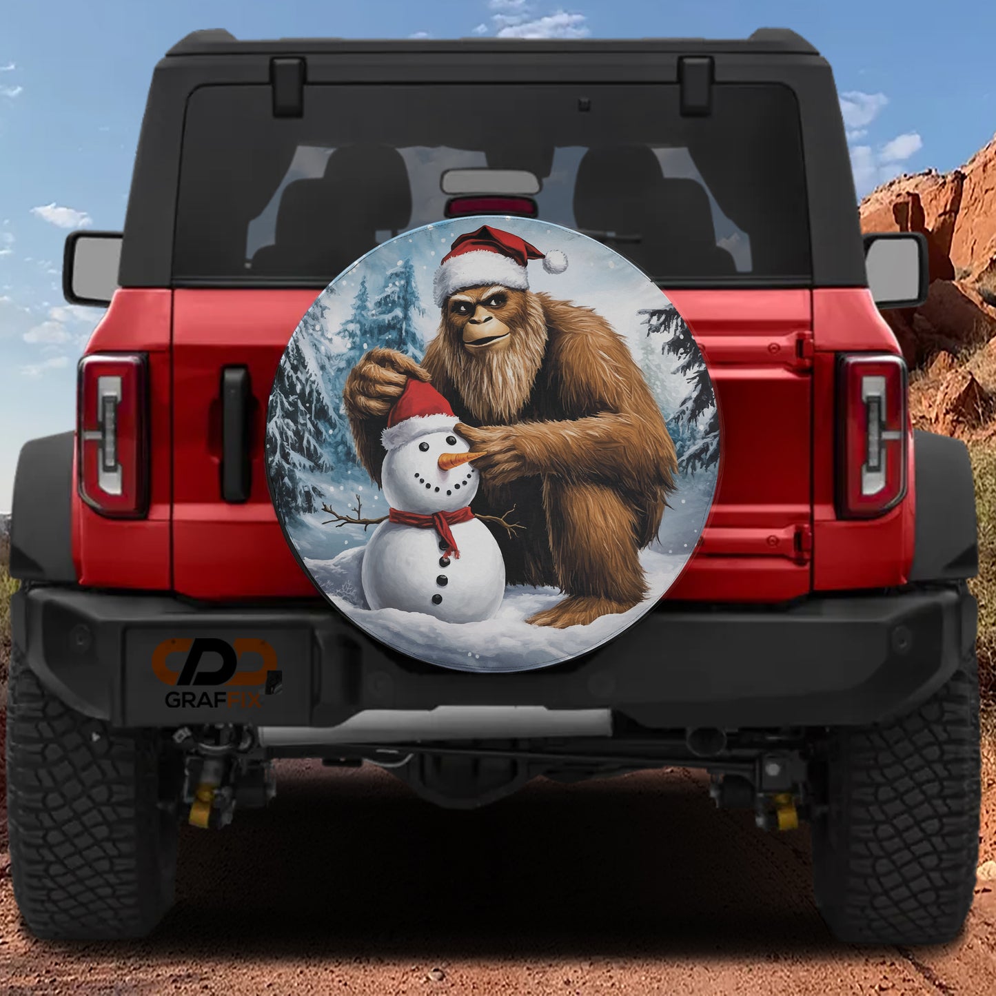 A red Jeep Wrangler with a large snowman and a Sasquatch-like creature on the back, set against a snowy landscape.