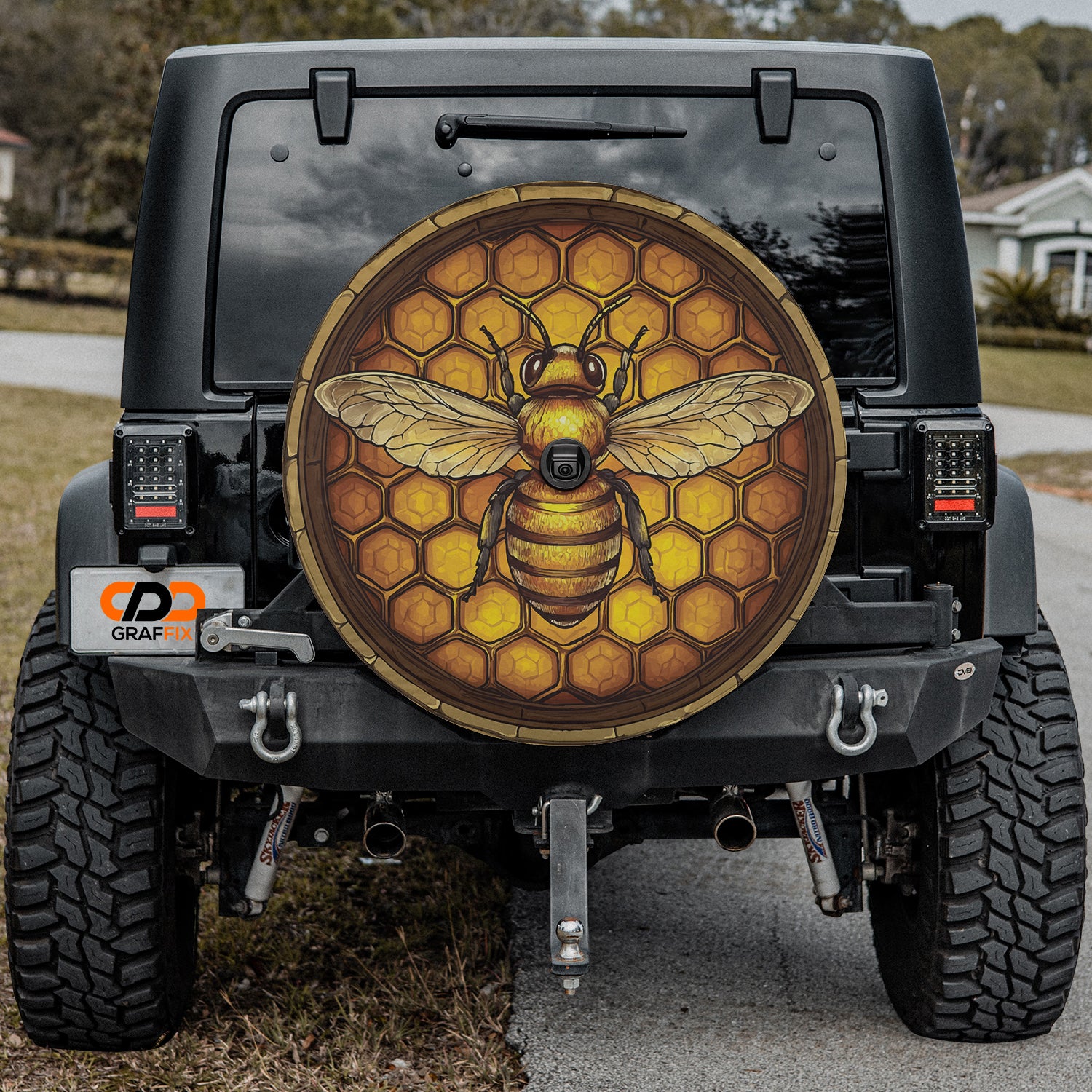 a jeep with a picture of a bee on it