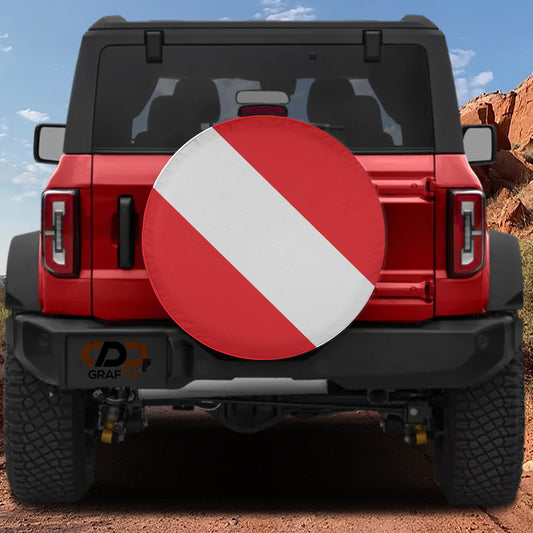 A red Jeep Wrangler with a white and red striped spare tire attached to the rear.