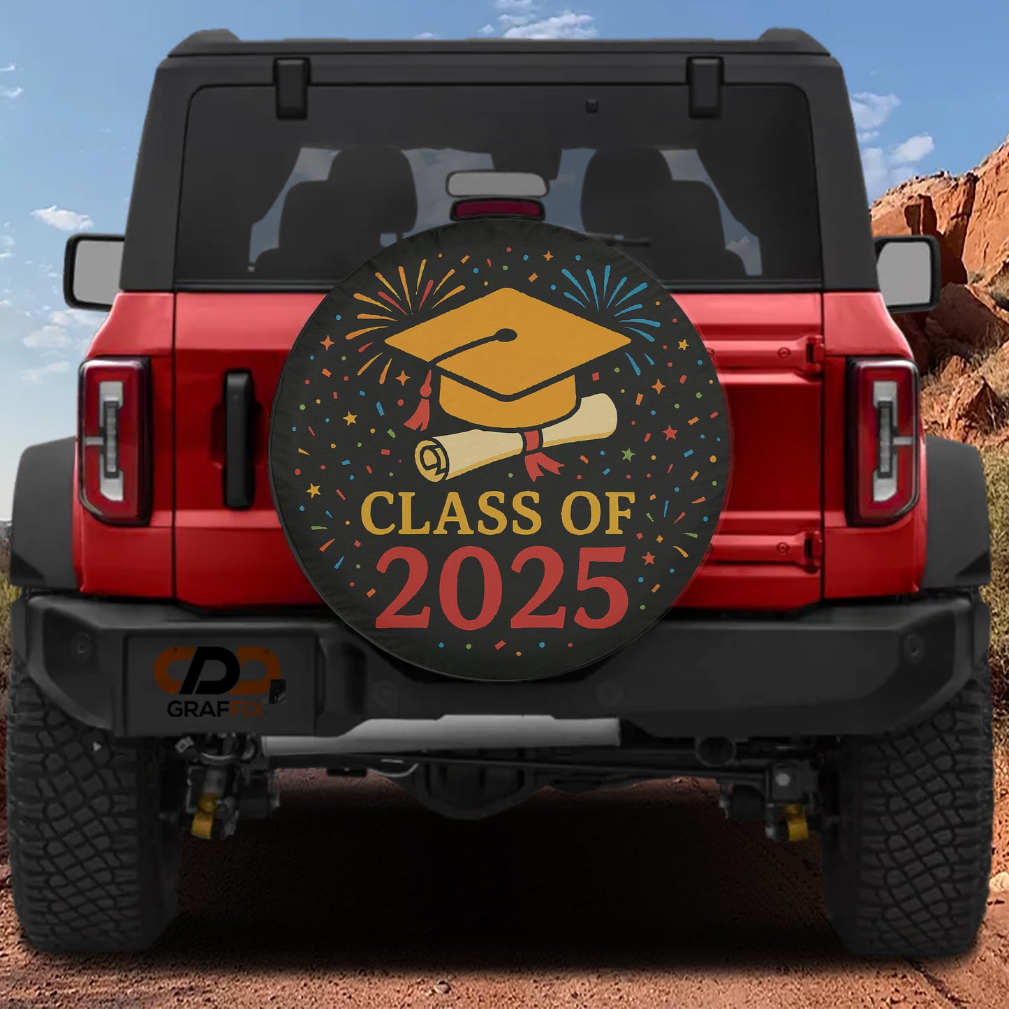 a red Jeep Wrangler with a graduation cap and mortarboard on the rear window, indicating a graduation celebration.