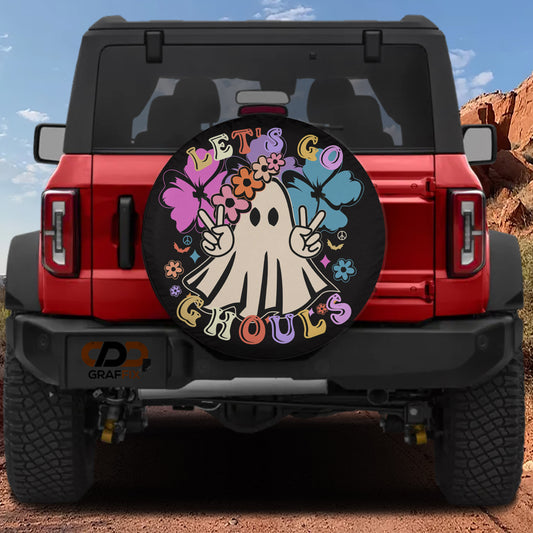 A red Jeep Wrangler with a large, colorful wheel cover featuring a ghost character and the text "Let's go Ghouls" on the back.