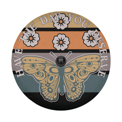 A circular design with a butterfly and flowers, along with the text "HAVE THE DAY YOU DESERVE" written around the edges.