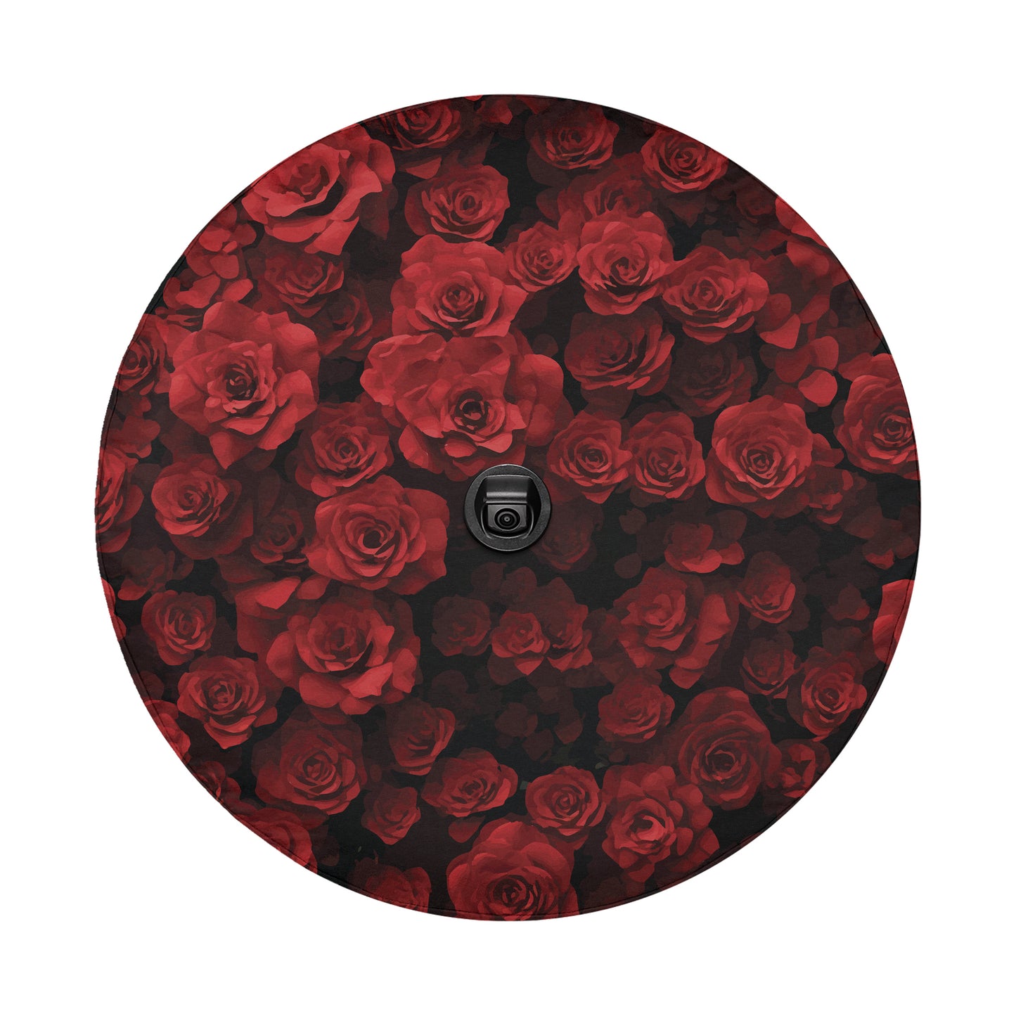 a circular pattern of red roses, with a black object in the center.