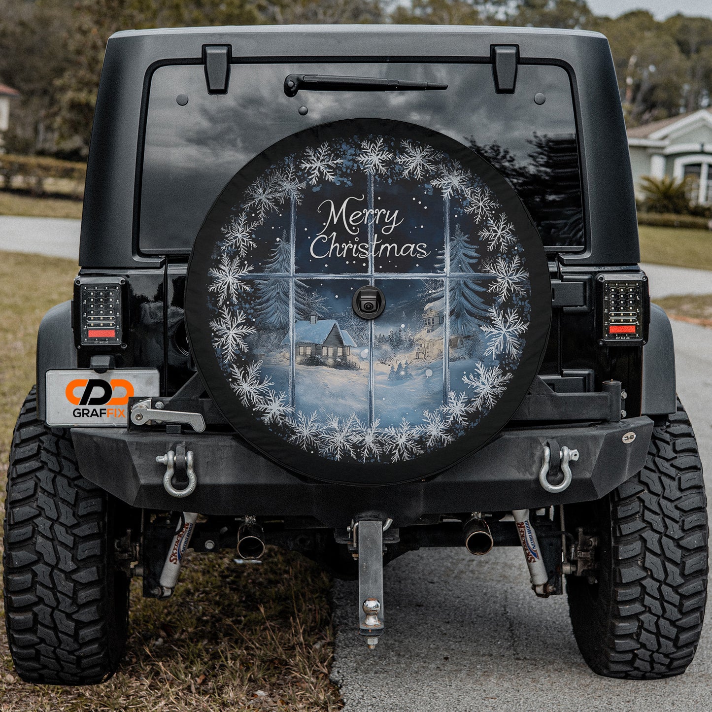 a black jeep with a merry christmas sign on it