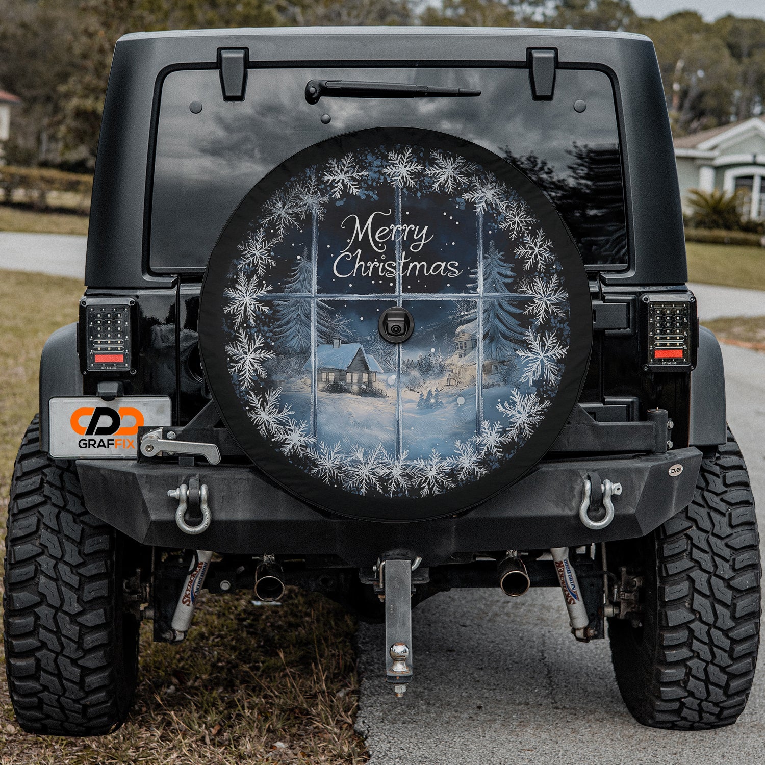 a black jeep with a merry christmas sign on it