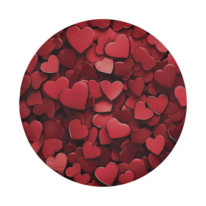 a circular arrangement of numerous red heart-shaped objects, creating a visually striking and vibrant display.